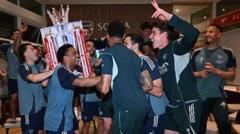 Boats, fire and a TikTok song – inside Arsenal’s title win