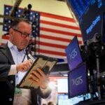 Wall St opens higher as investors weigh earnings; PayPal jumps