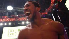 Joshua’s emotional win over Prenga in pictures