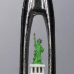 Micro sculpture of Statue of Liberty inside needle’s eye marks USA’s Freedom 250