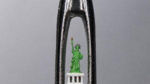 Micro sculpture of Statue of Liberty inside needle’s eye marks USA’s Freedom 250