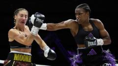 Dubois beats Moore to keep Baumgardner in picture