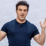 Humans need to ‘surf the wave’ of AI rather than get swallowed by it, Chesky says at Communacopia