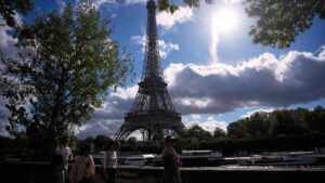 Not involved, says government amid controversy over religious group’s Eiffel Tower tour