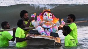 Glitzy Ganesh idol immersions leave behind chaos