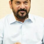 Revanth reviews distribution of uniforms, essentials to government school students